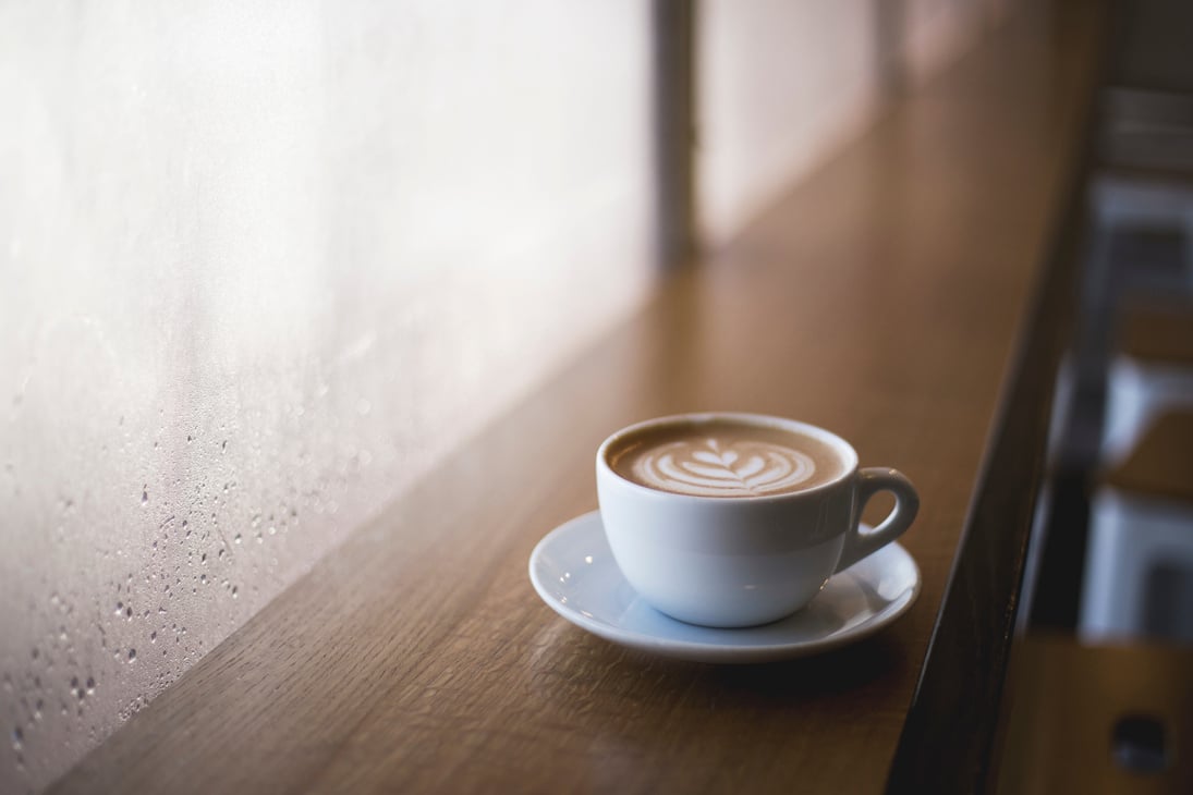 Cup of Coffee on Wooden Table